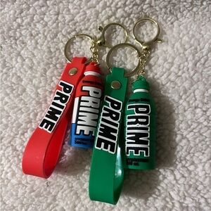 Pair of Prime Energy Drink Keychains, Green & Red/White/Blue